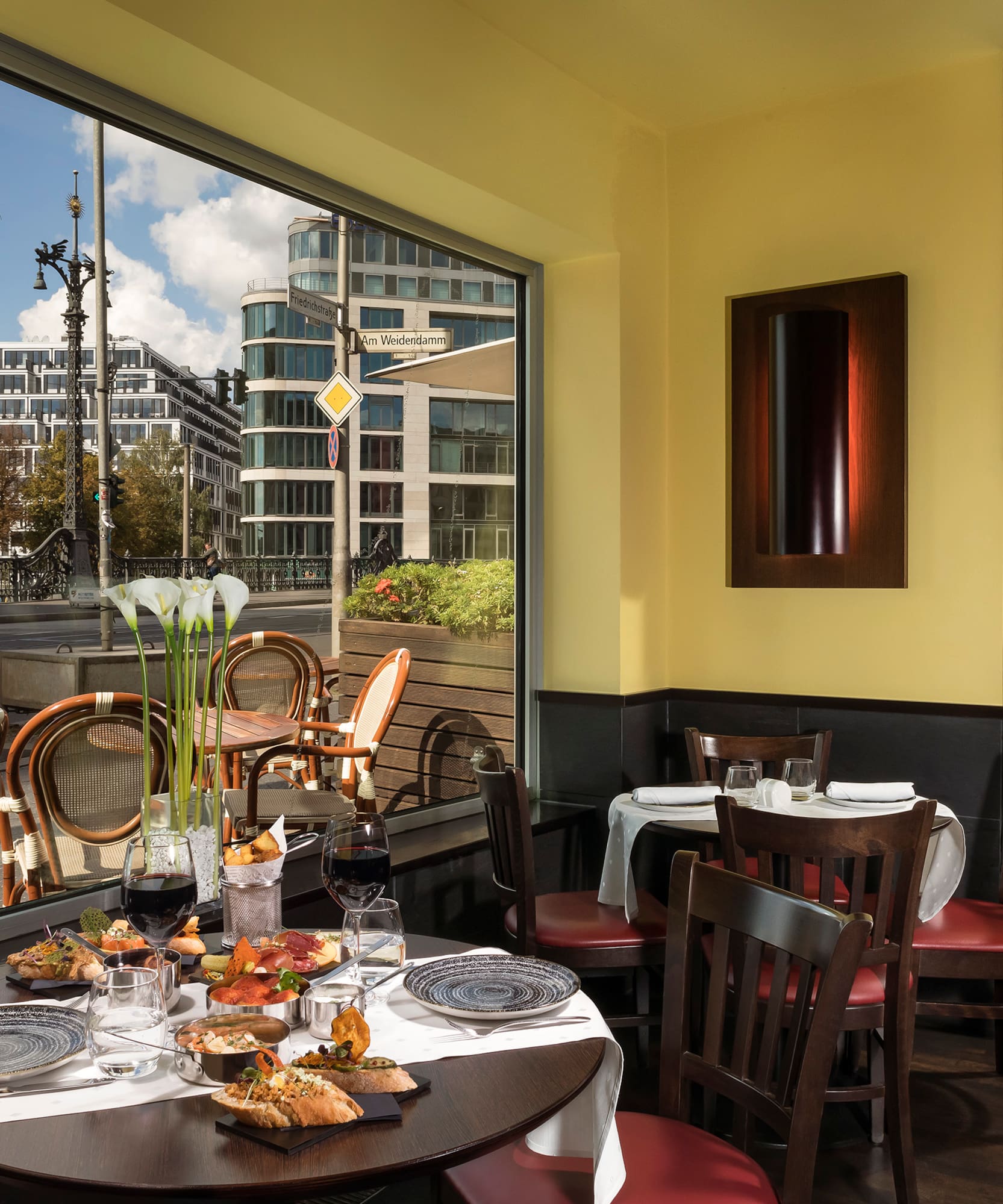 a restaurant with tables and chairs