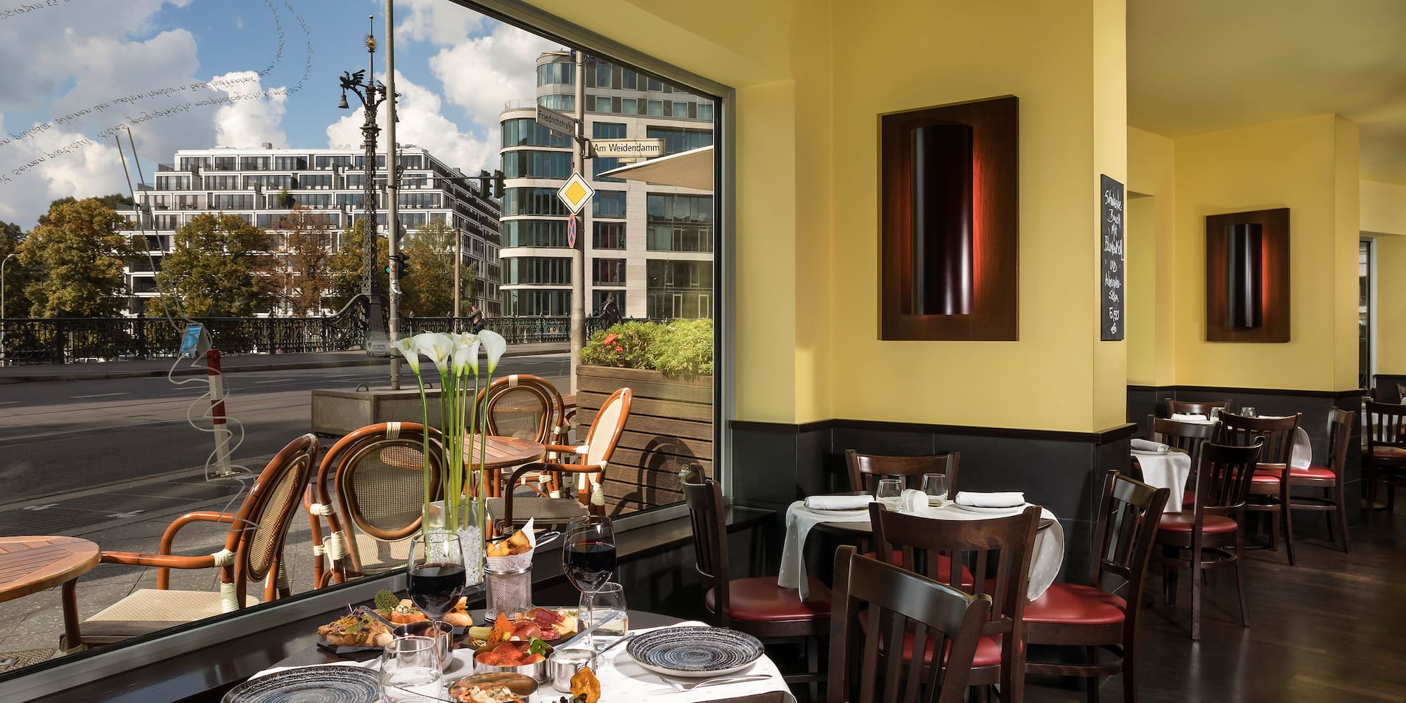a restaurant with tables and chairs