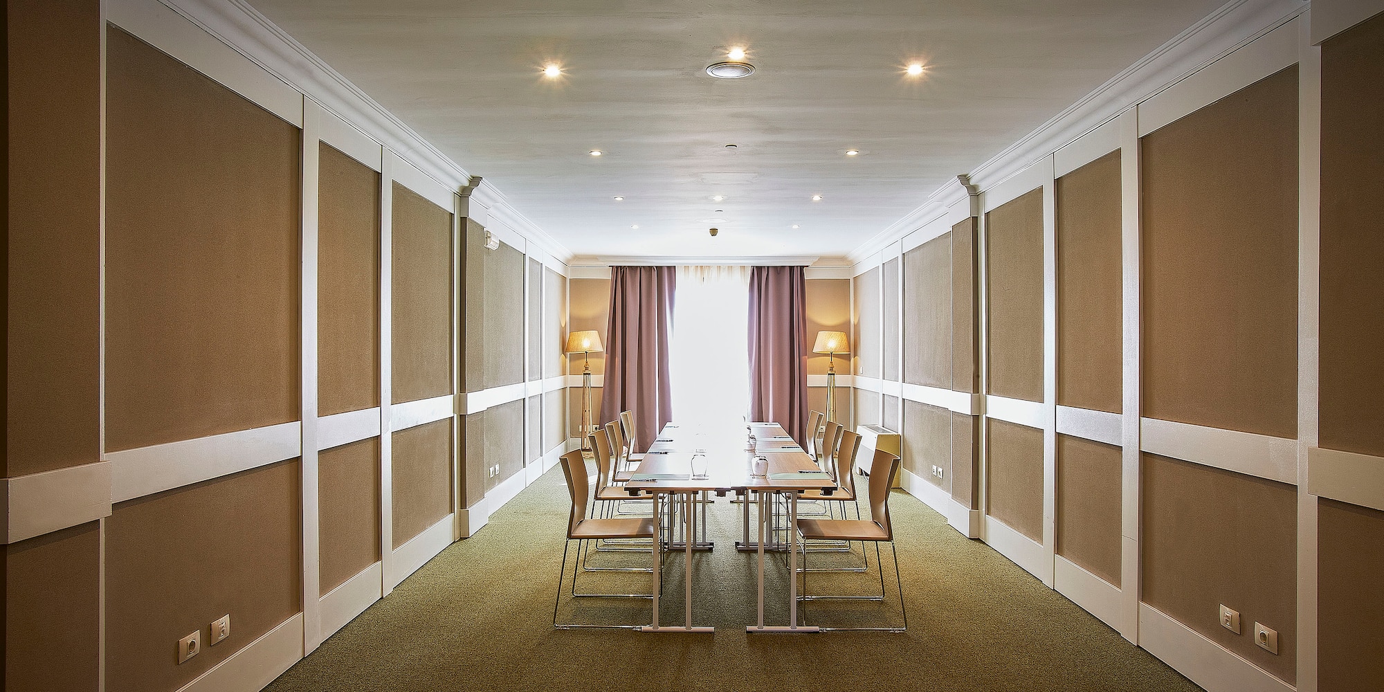 a room with a table and chairs