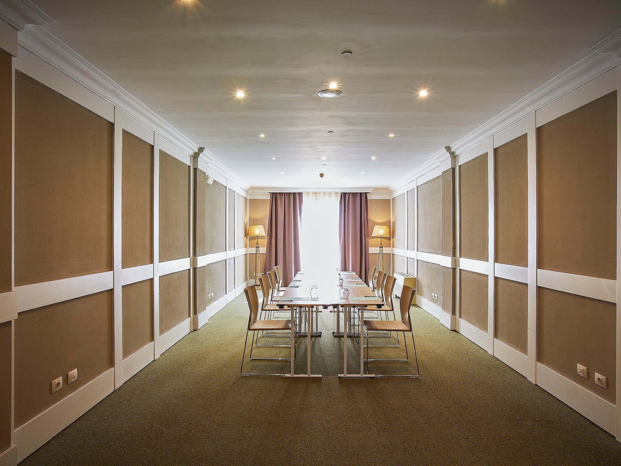 a room with a table and chairs