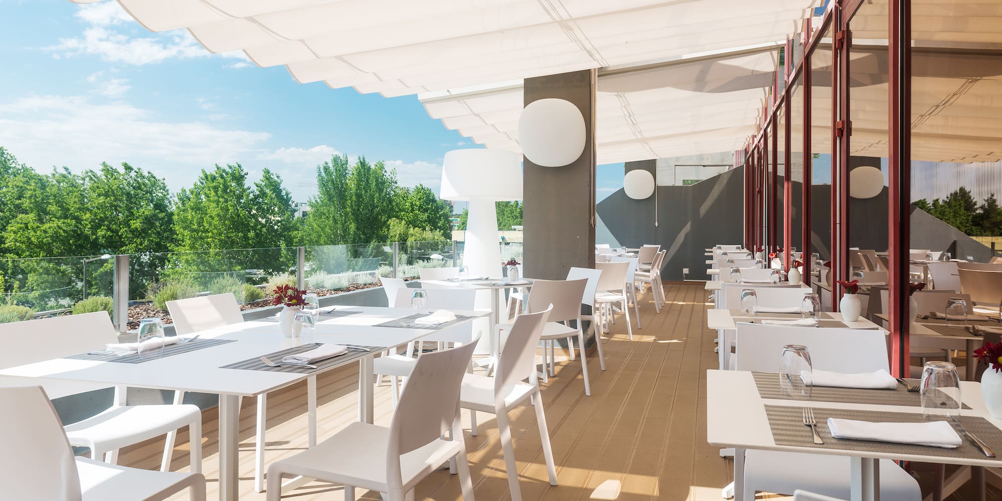 a white tables and chairs on a deck