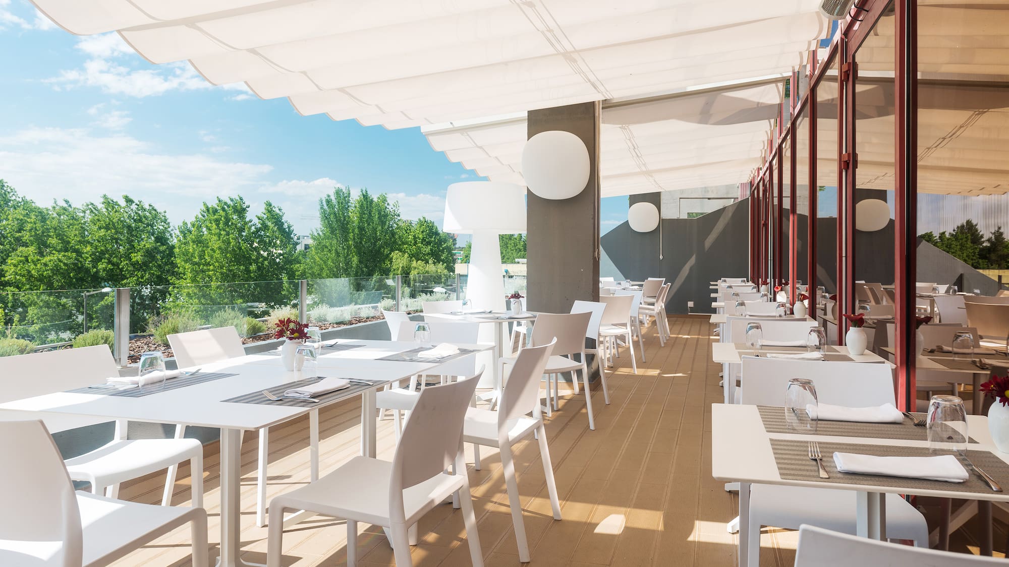 a restaurant with tables and chairs