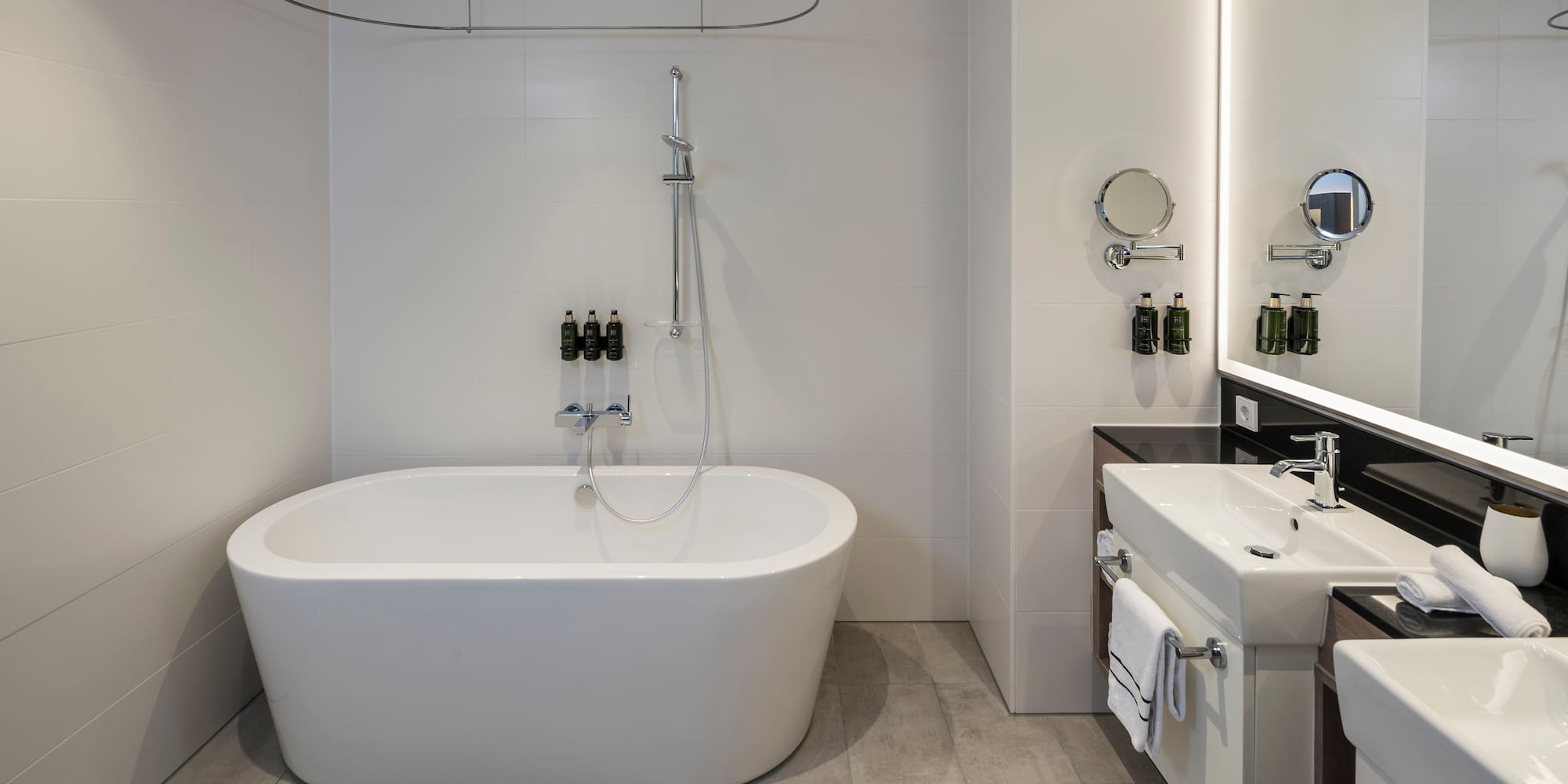a bathroom with a tub and sink