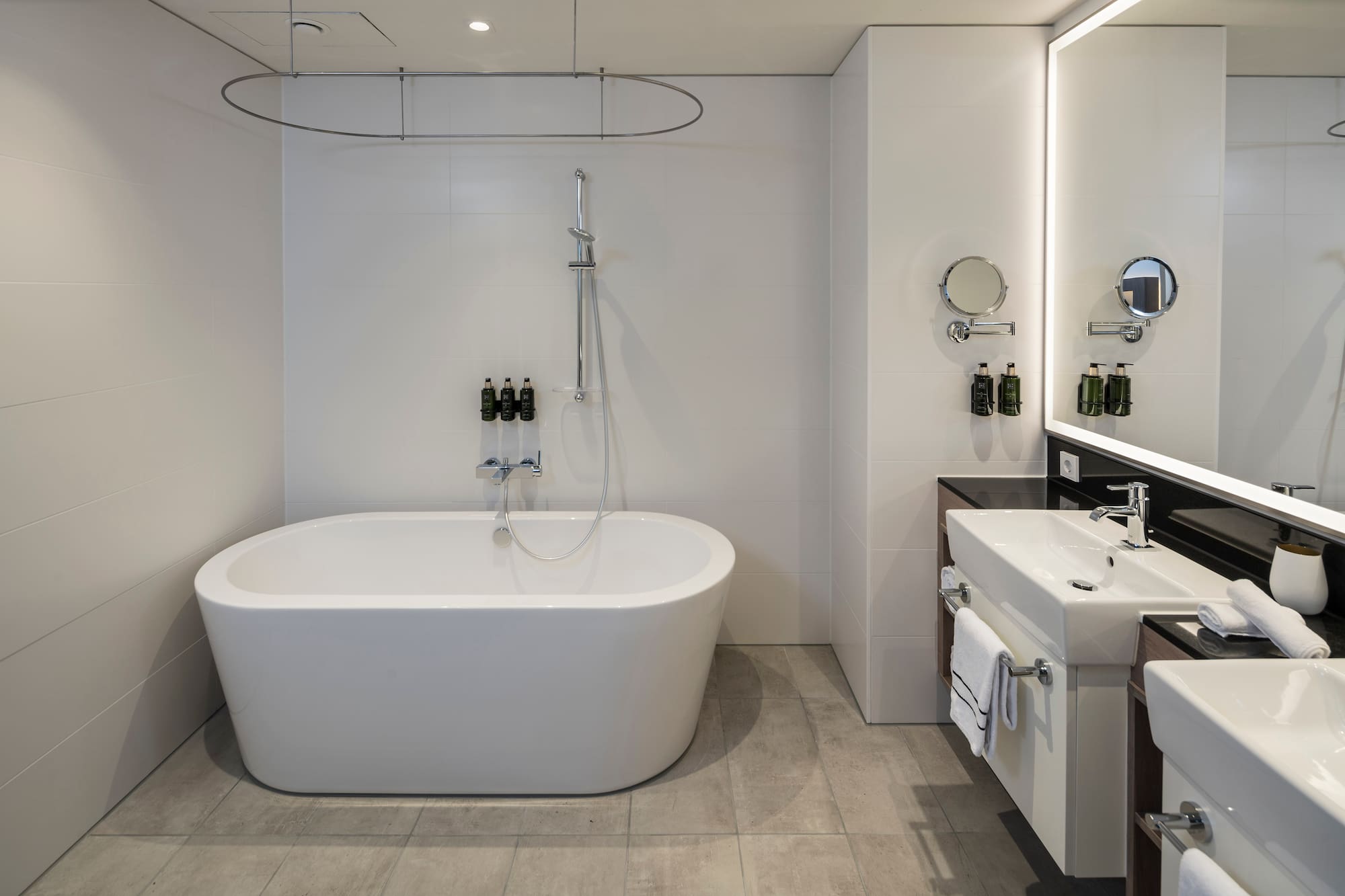 a bathroom with a tub and sink