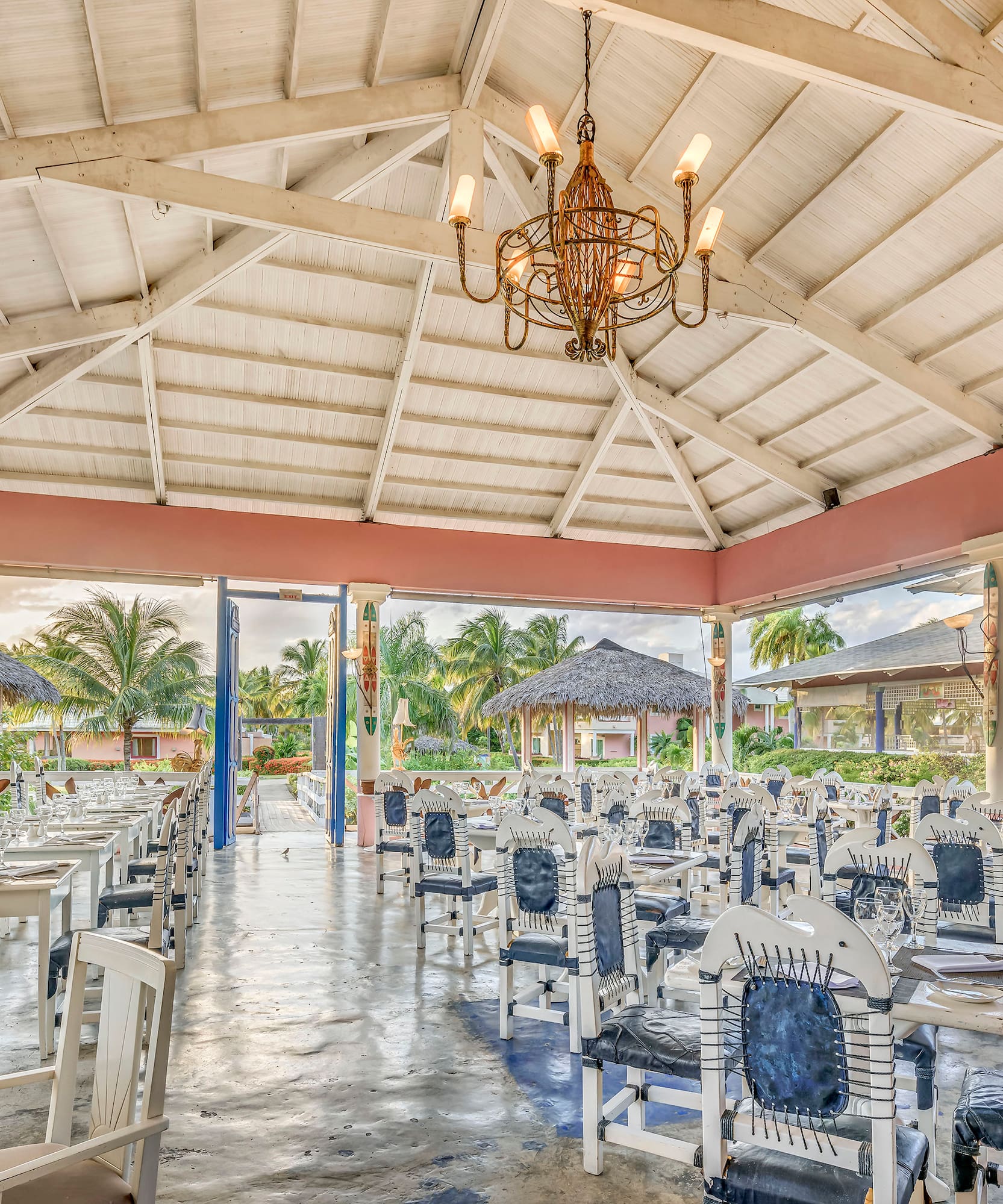 a room with tables and chairs