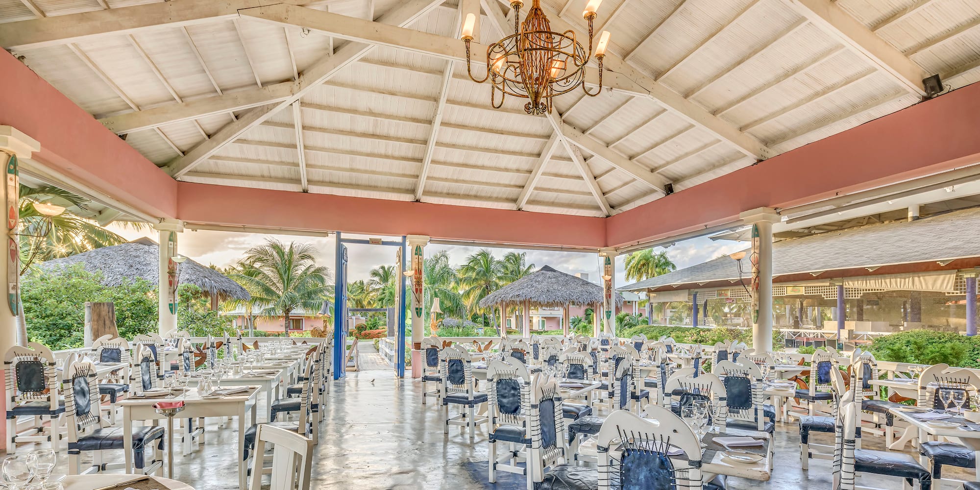 a room with tables and chairs