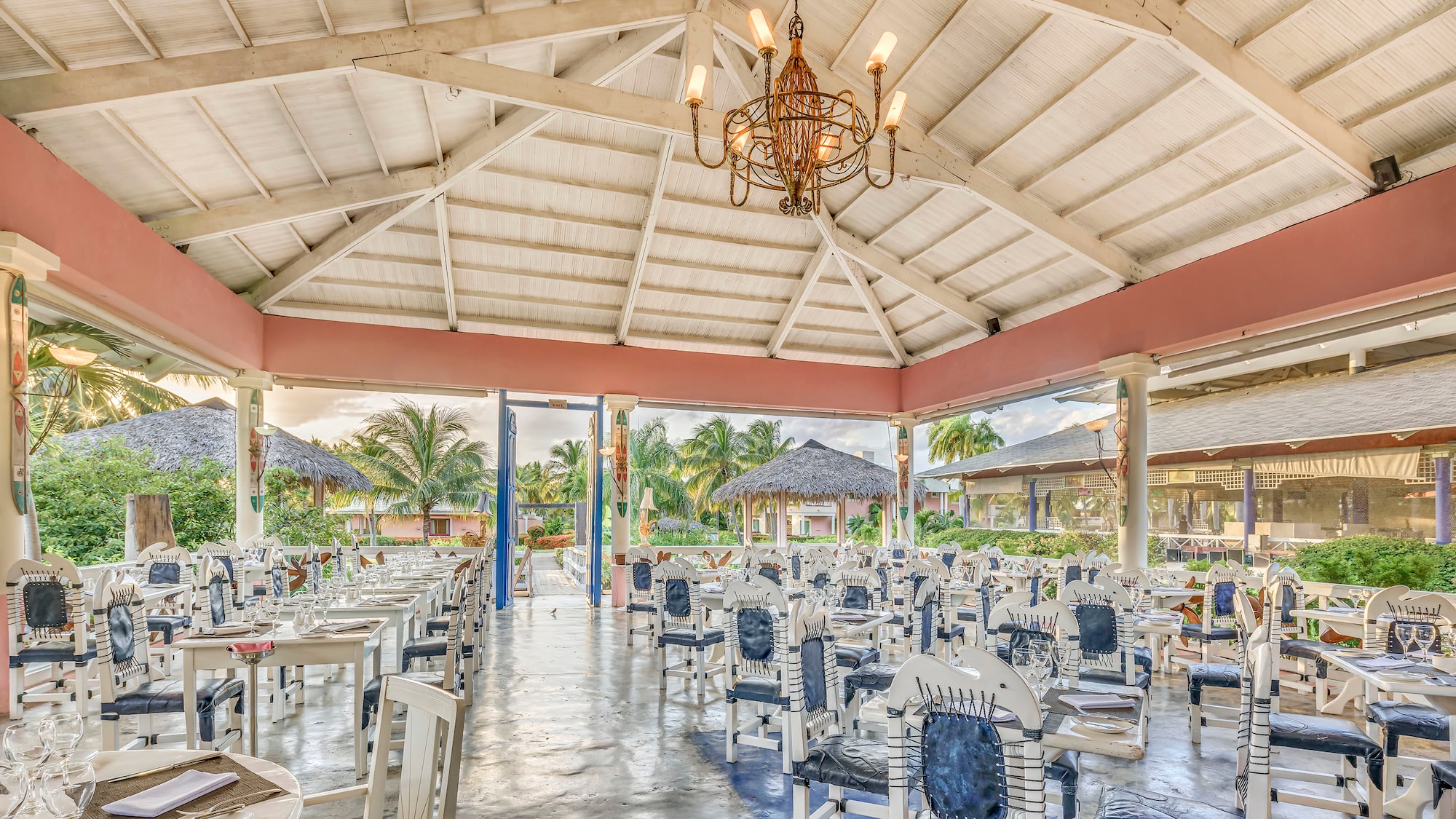 a room with tables and chairs