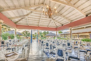a room with tables and chairs