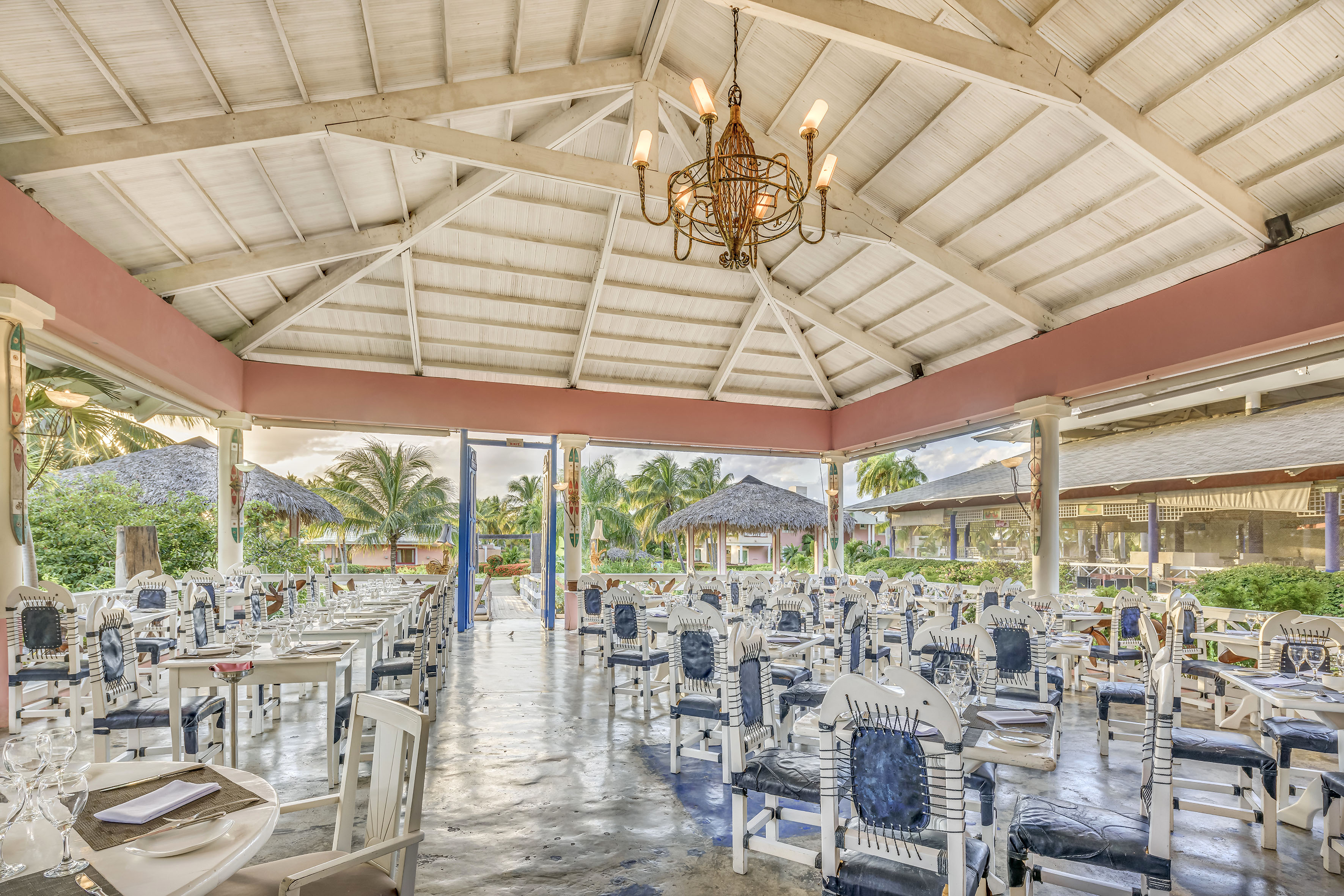 a room with tables and chairs