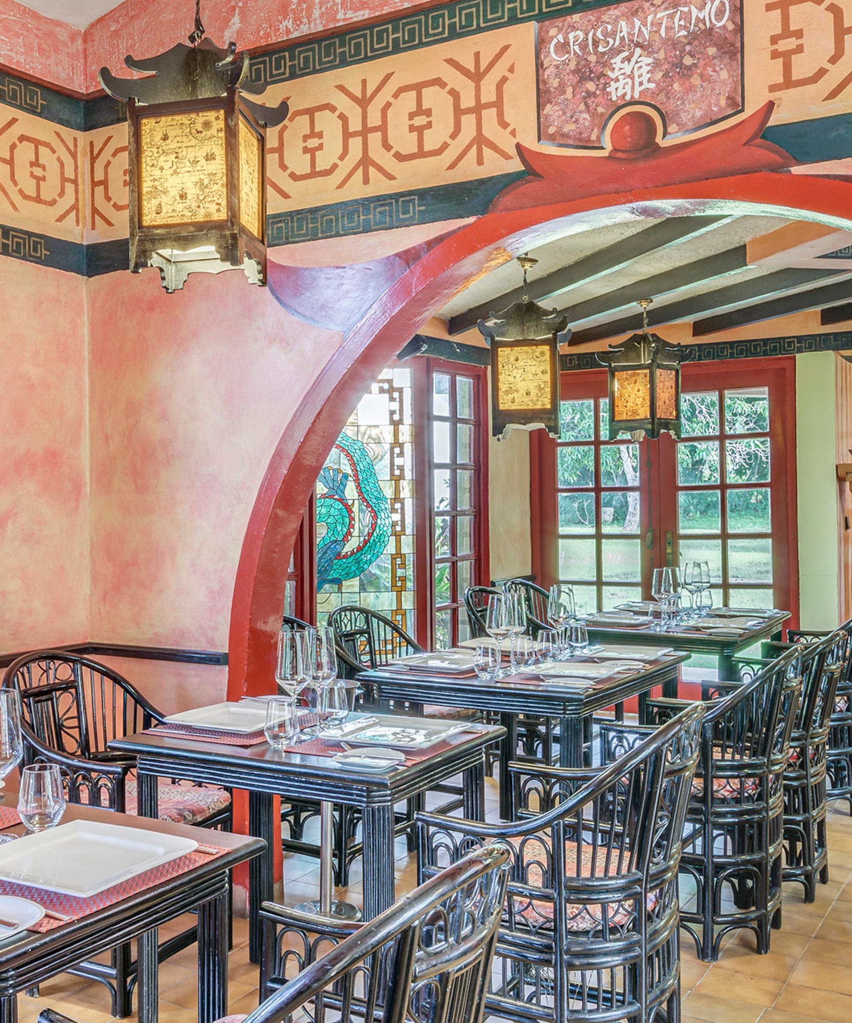 a restaurant with tables and chairs