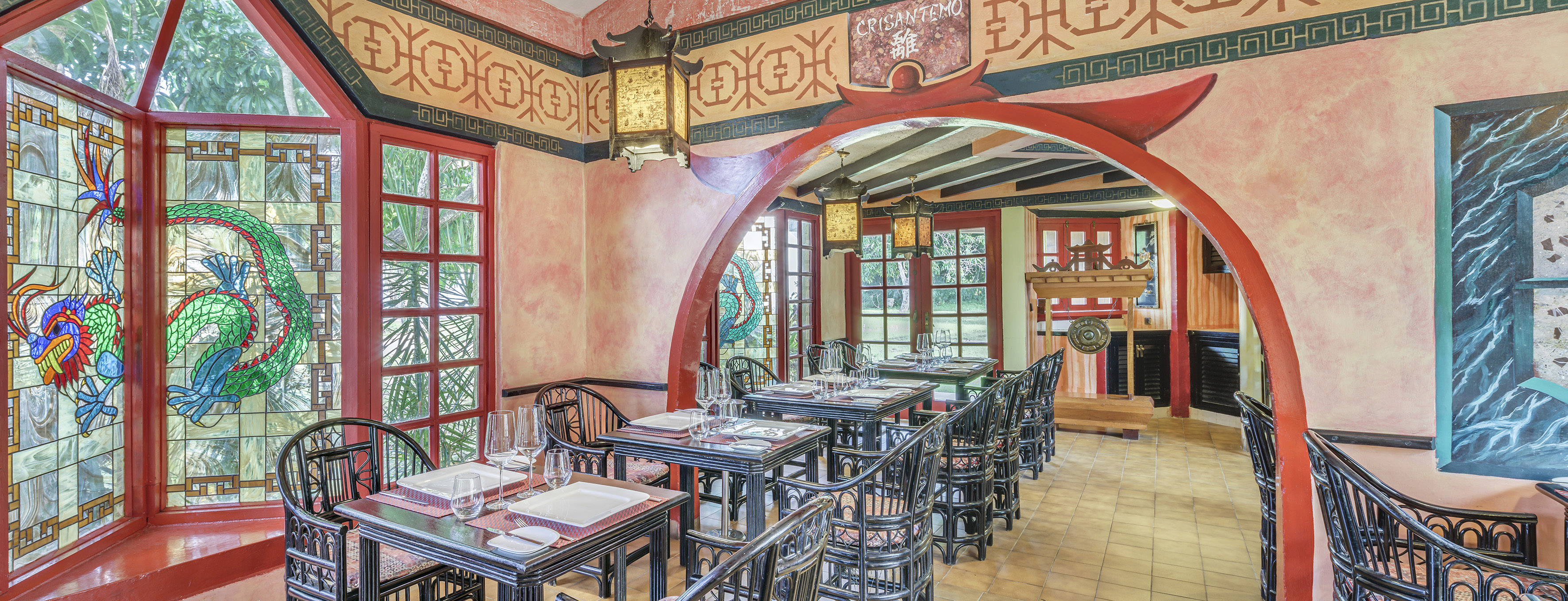 a restaurant with tables and chairs