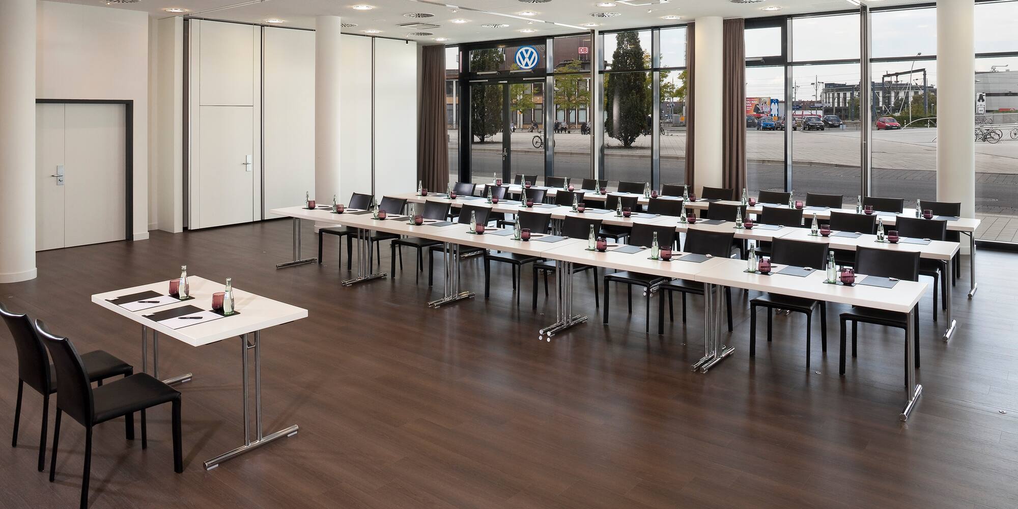 a room with tables and chairs