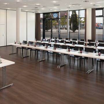 a room with tables and chairs