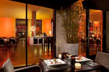 a restaurant with a glass door