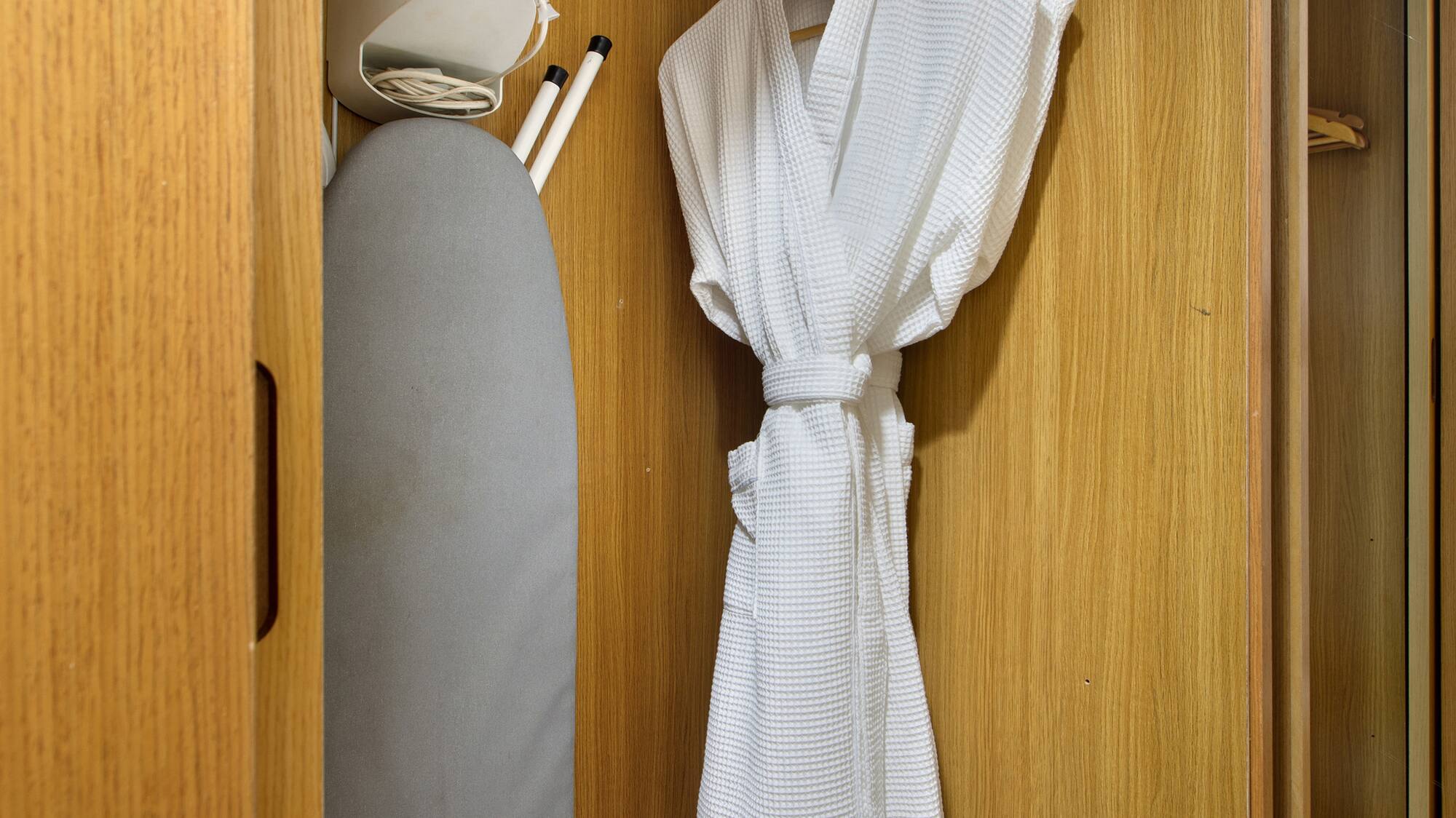 a white robe in a closet