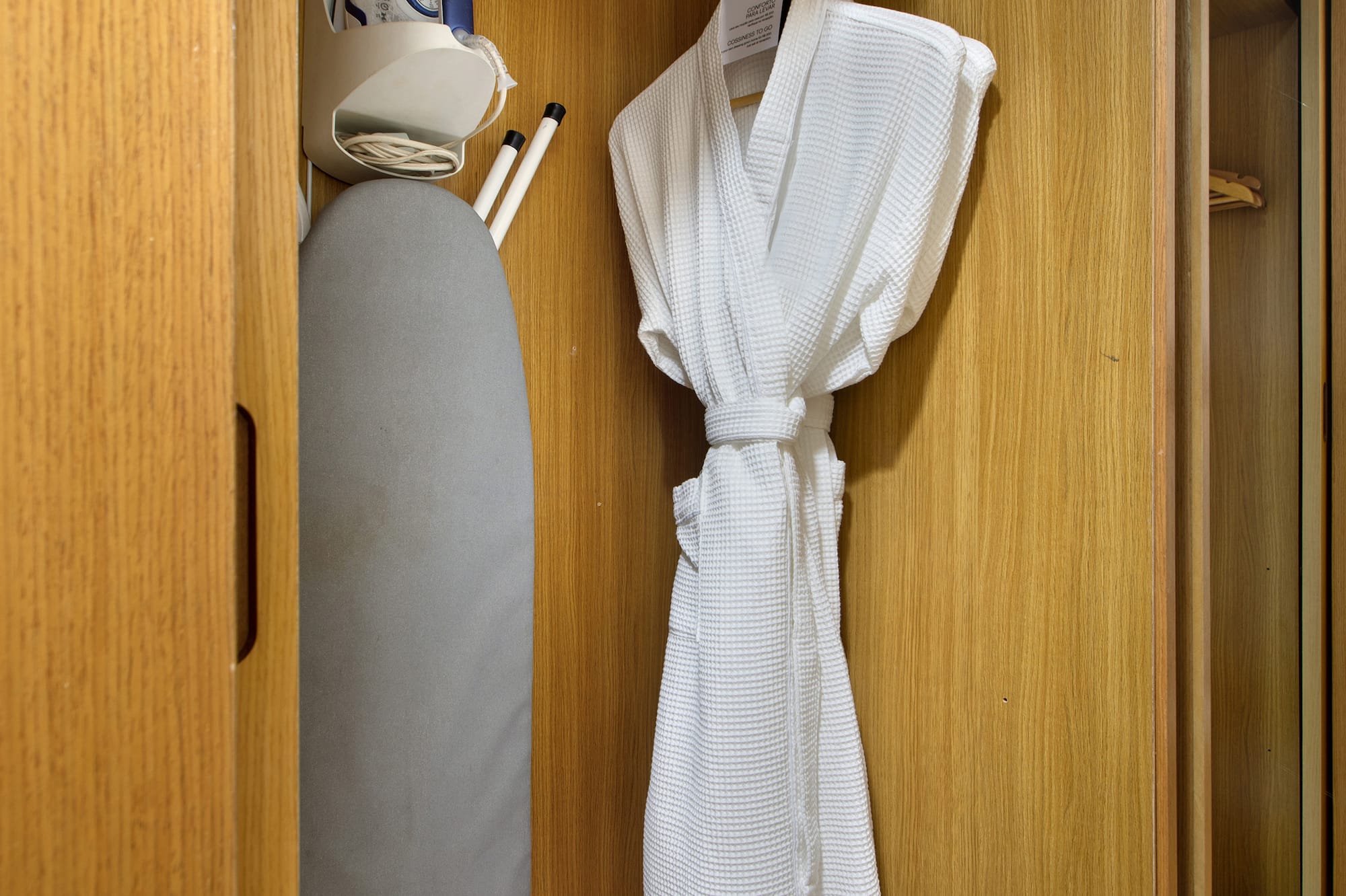 a white robe in a closet