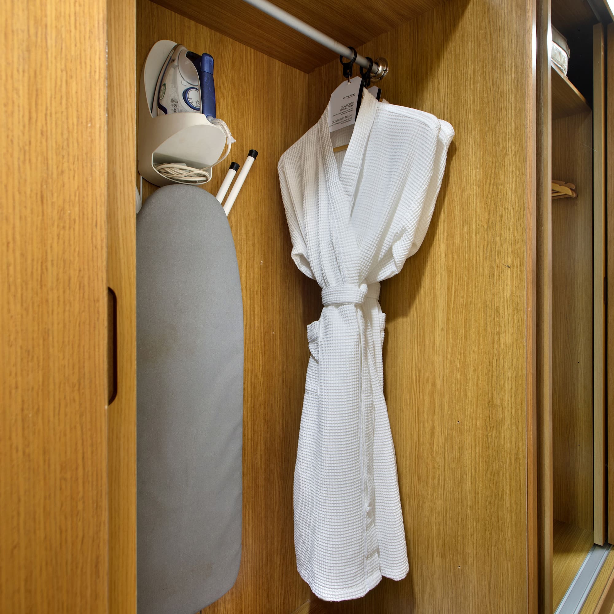 a white robe in a closet