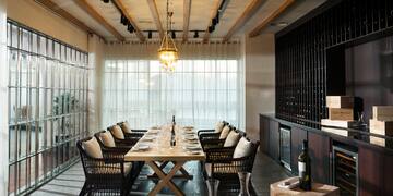 a room with a table and chairs