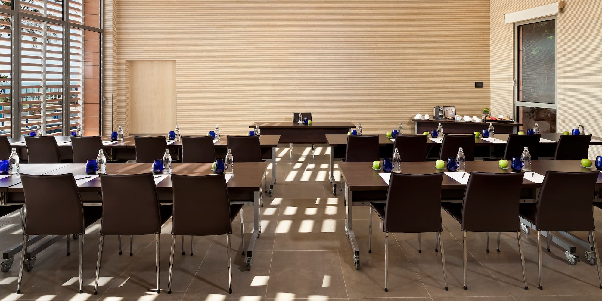 a room with tables and chairs