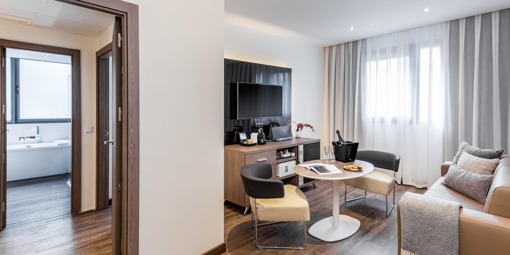 a room with a table and chairs