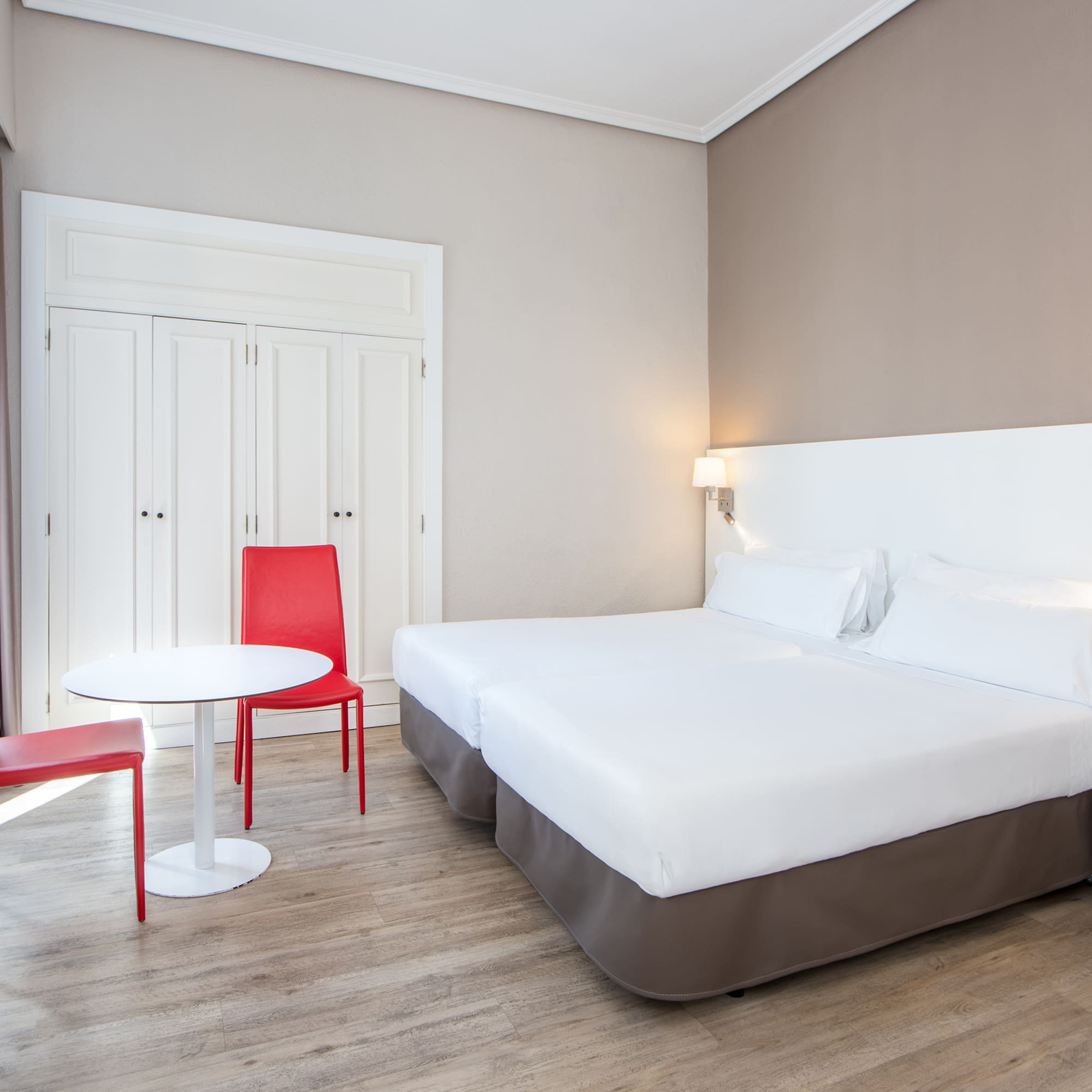 a room with a bed and a table