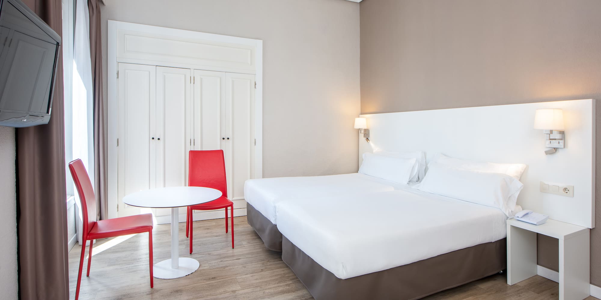 a room with a bed and a table