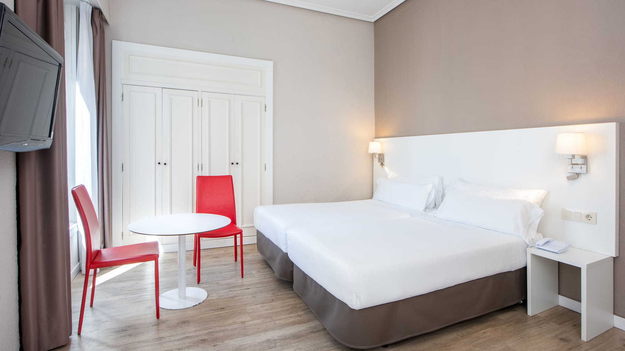 a room with a bed and a table