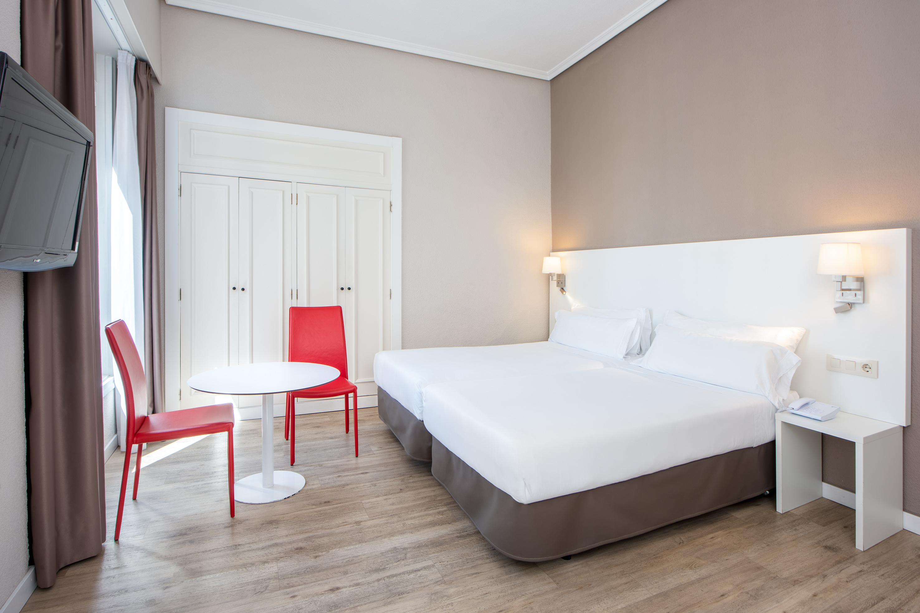 a room with a bed and a table