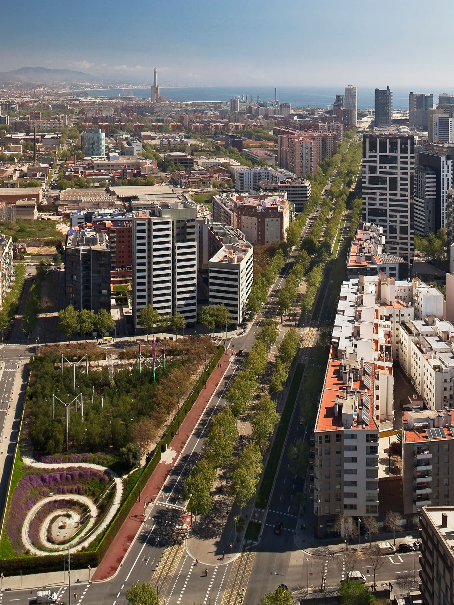 a city with many buildings and a road