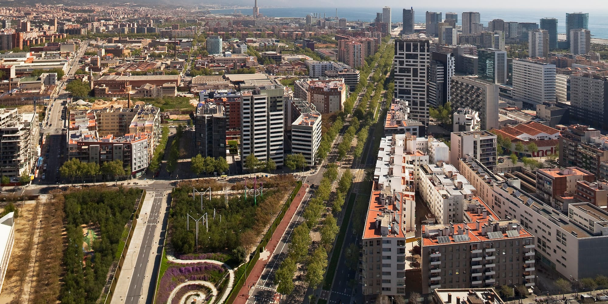 a city with many buildings and a road