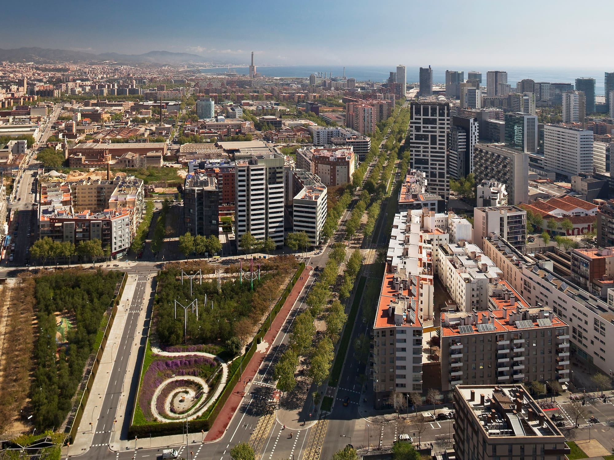 a city with many buildings and a road