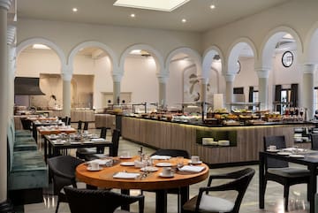 a restaurant with tables and chairs