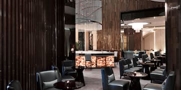 a room with chairs and tables