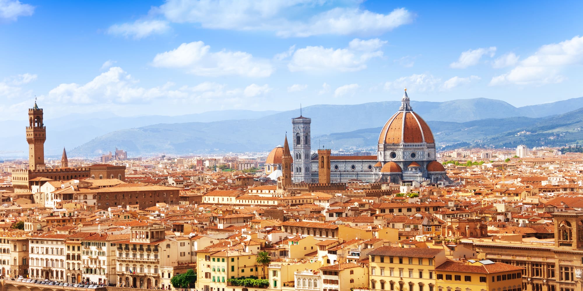 a city with a large dome and a river