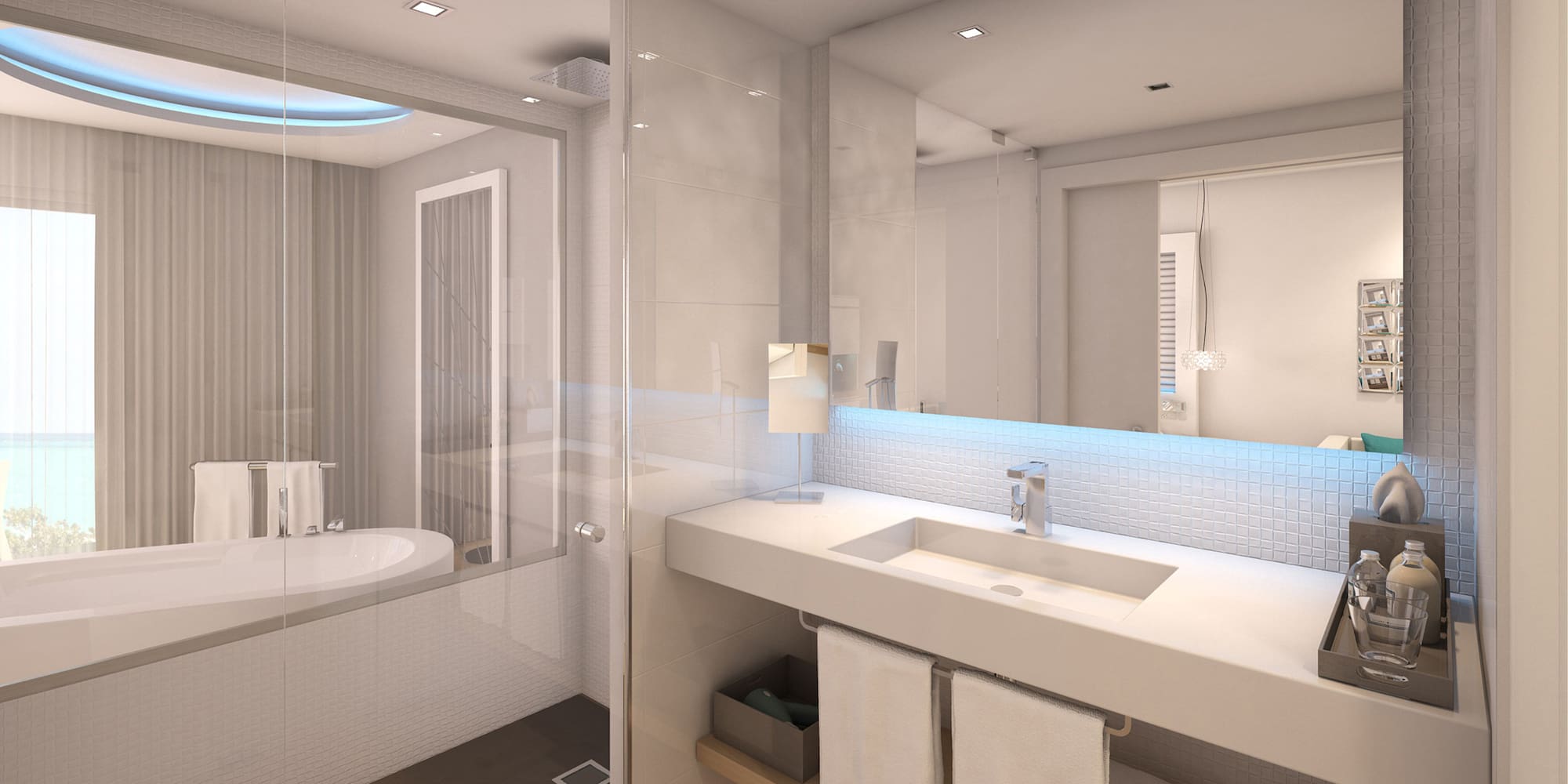 a bathroom with a glass shower and a sink