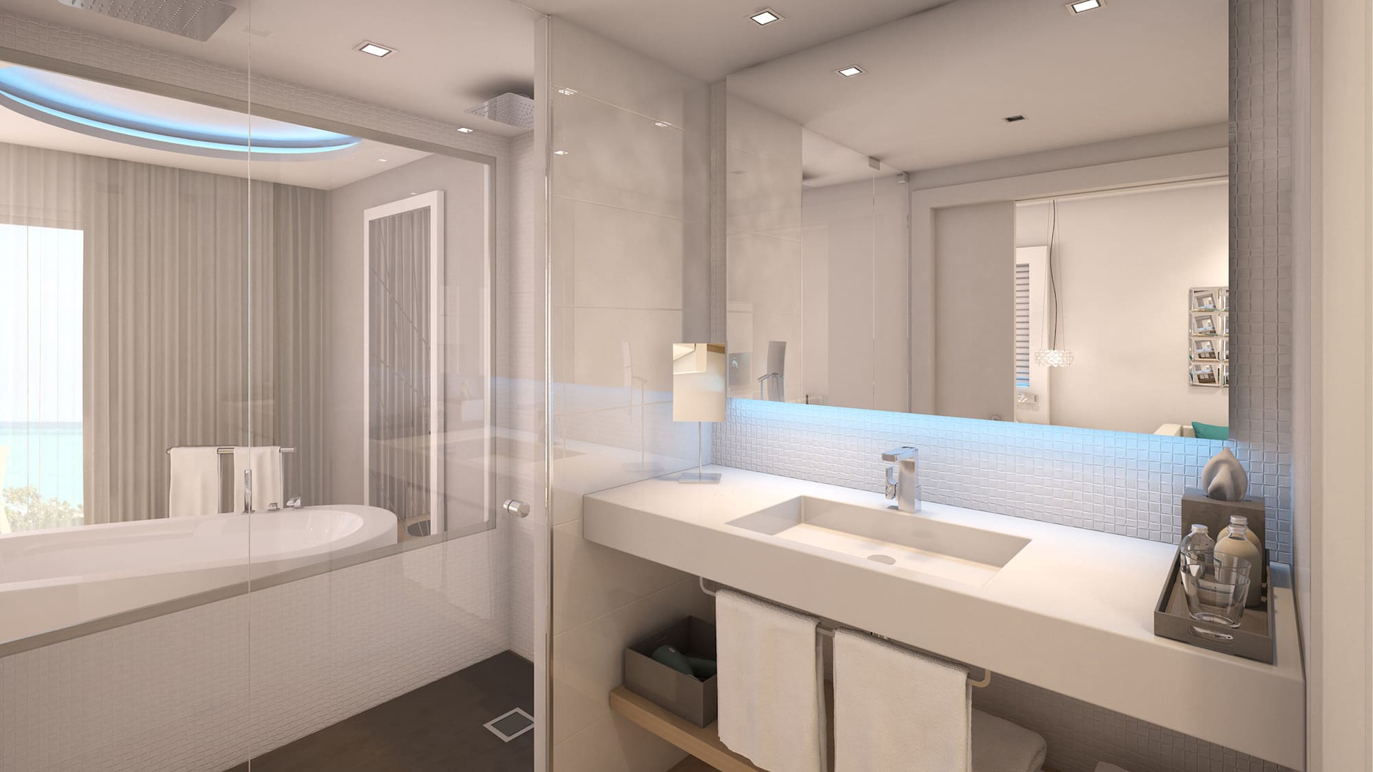 a bathroom with a glass shower and a sink