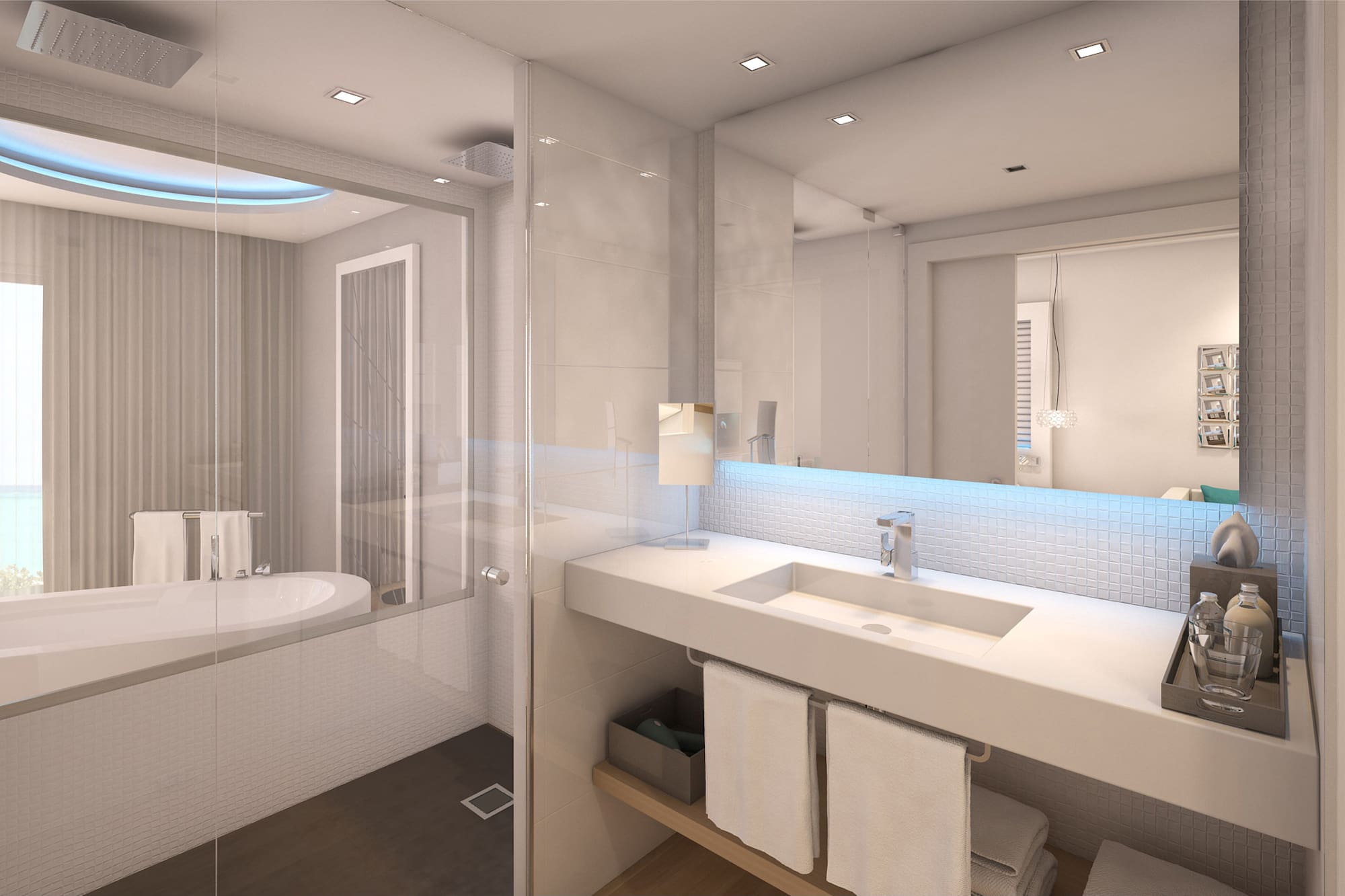 a bathroom with a glass shower and a sink