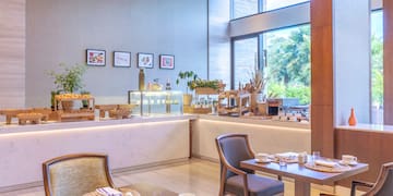 a restaurant with tables and chairs