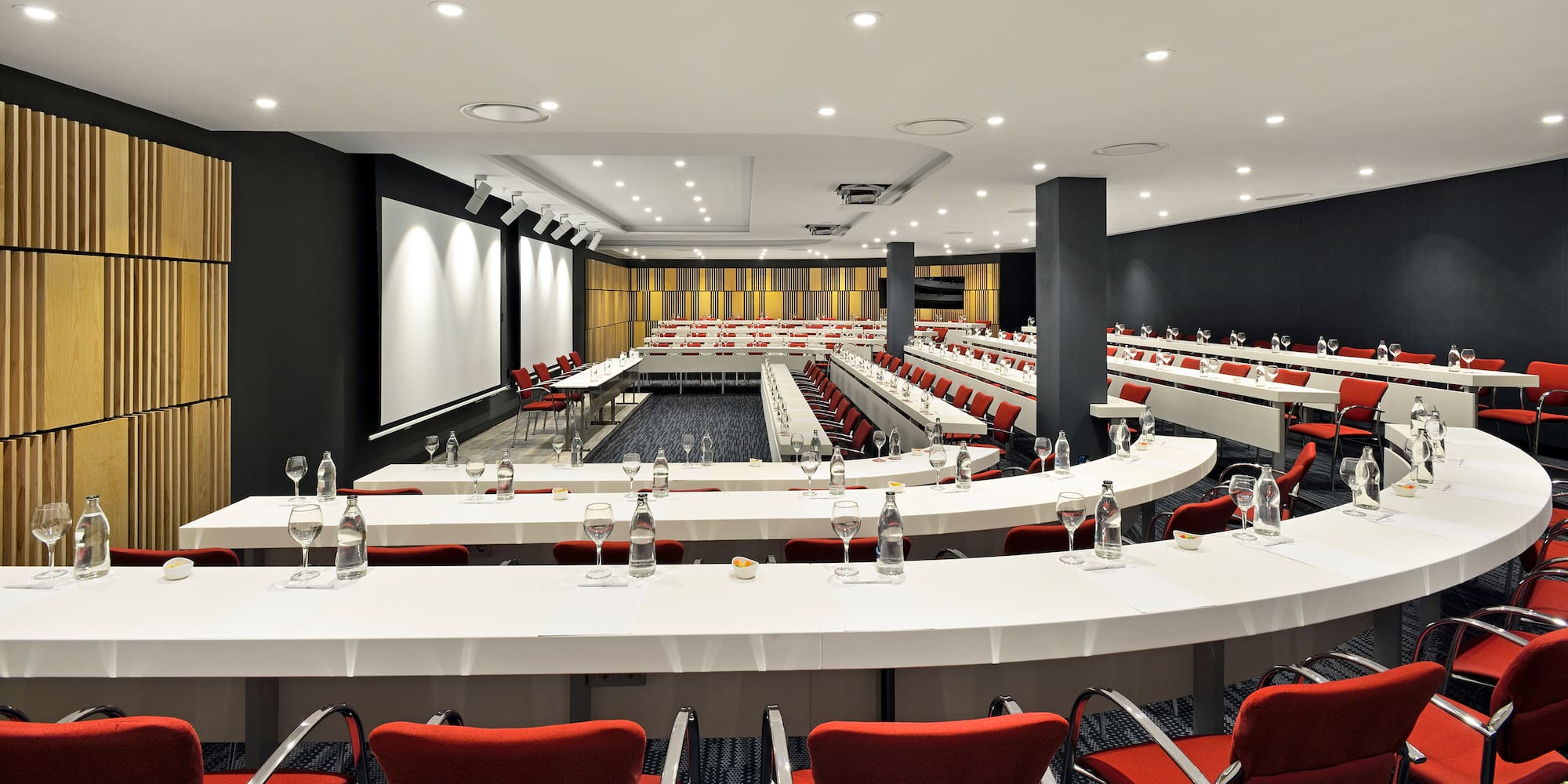 a room with tables and chairs