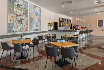 a room with tables and chairs