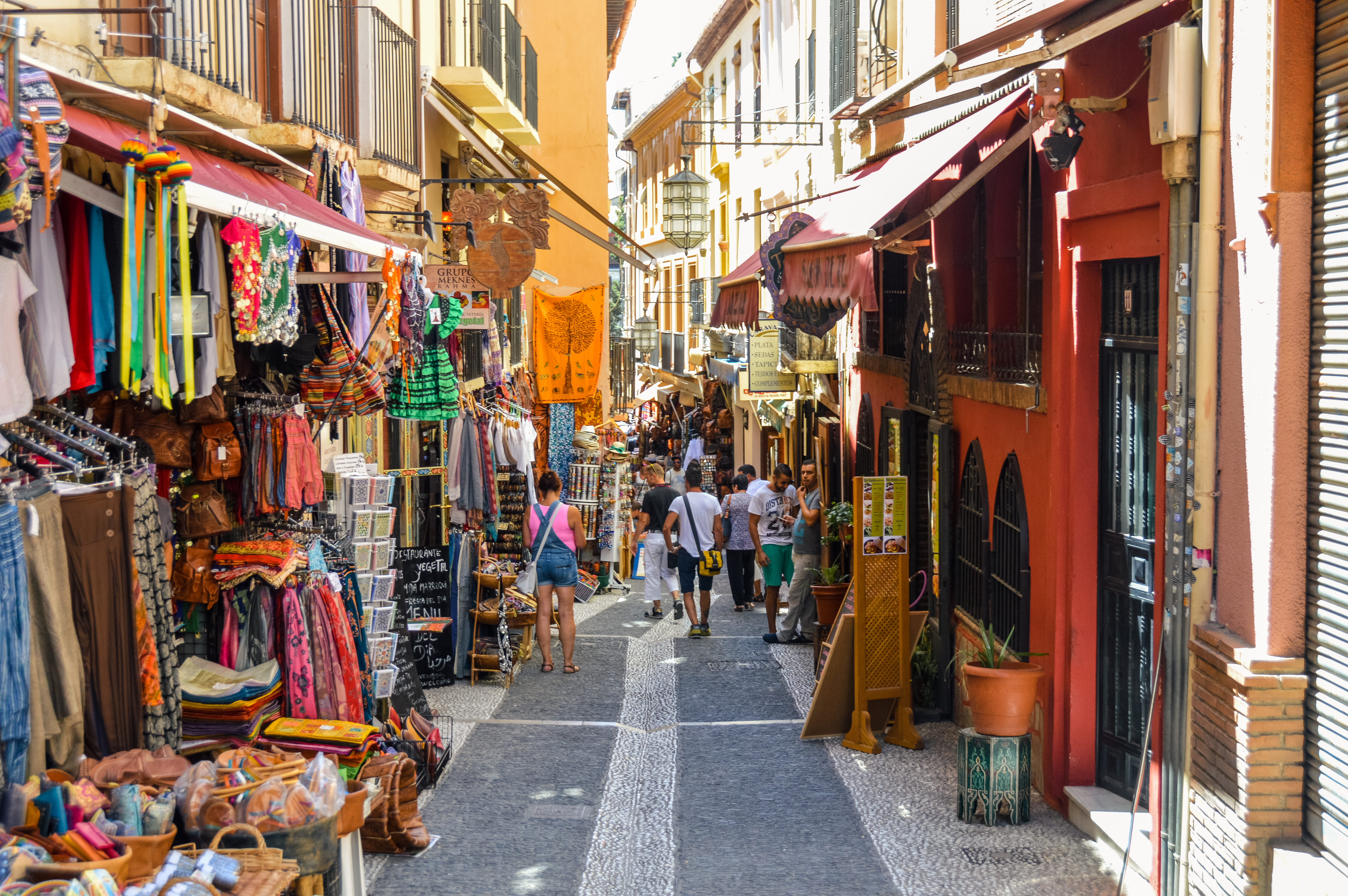 a street with people walking down it