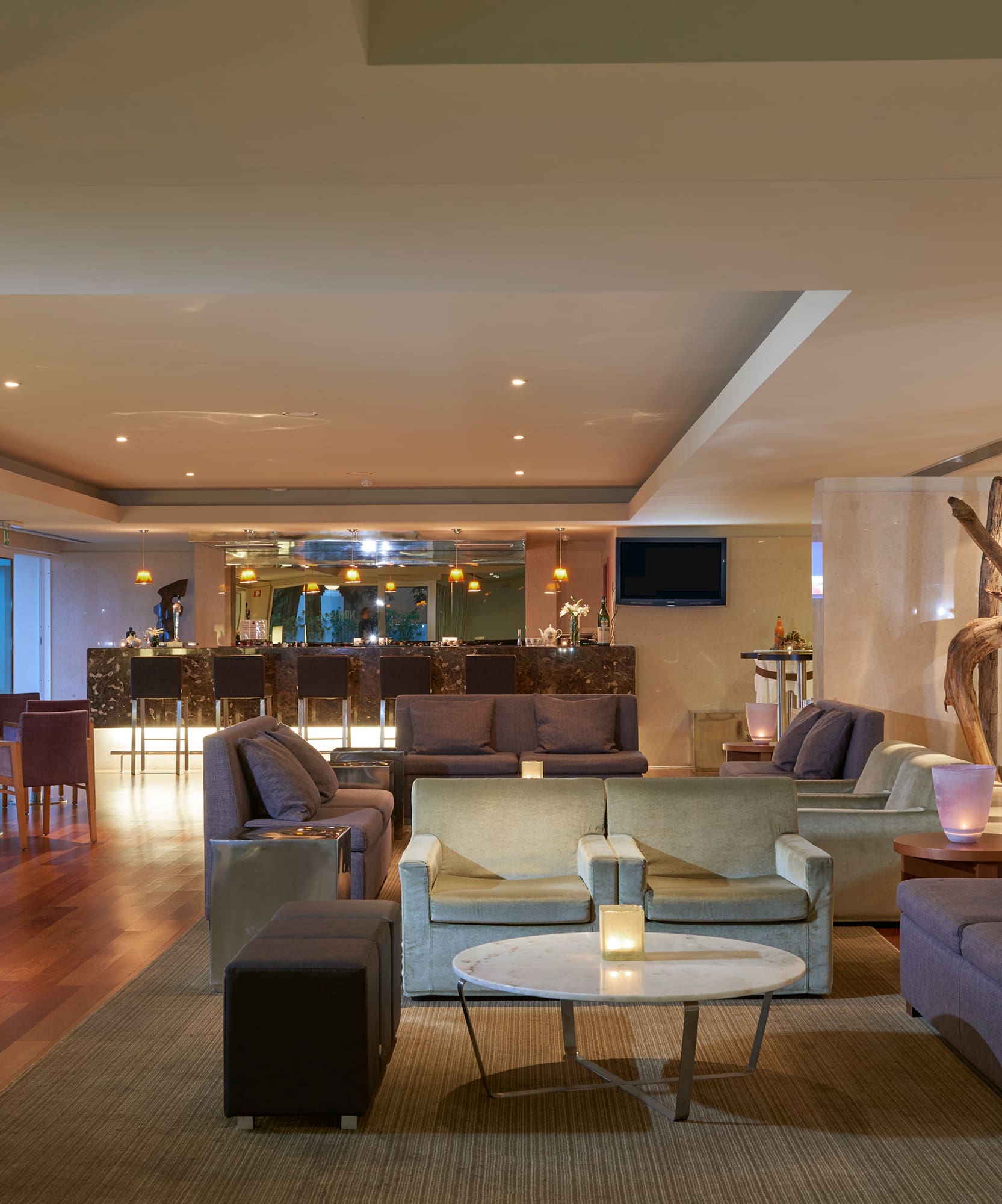 a room with a large table and chairs