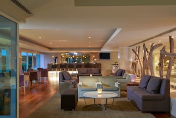 a room with a large table and chairs