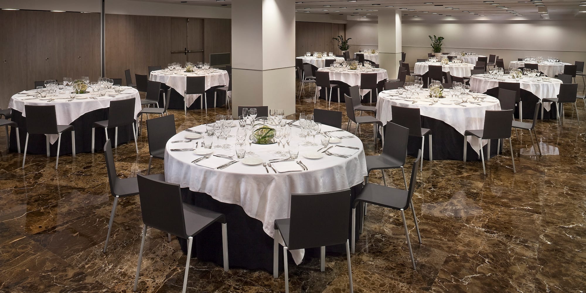 a room with tables and chairs