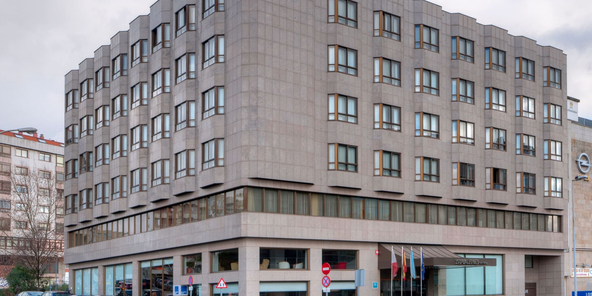 a building with cars parked in front of it