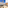 Outdoor spa patio with hot tubs, desert cactus garden, palm tree, and waterfall.