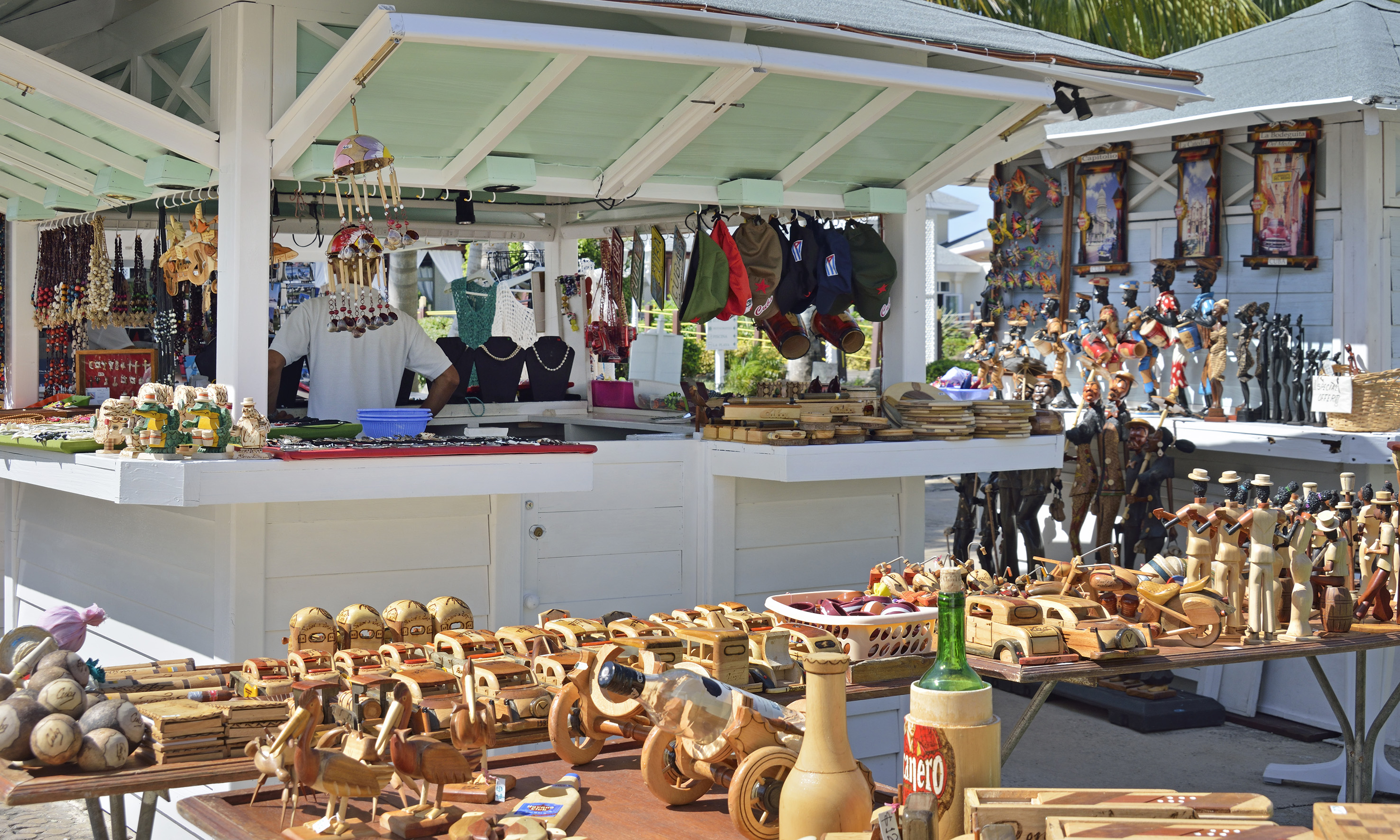 a man selling items at a market