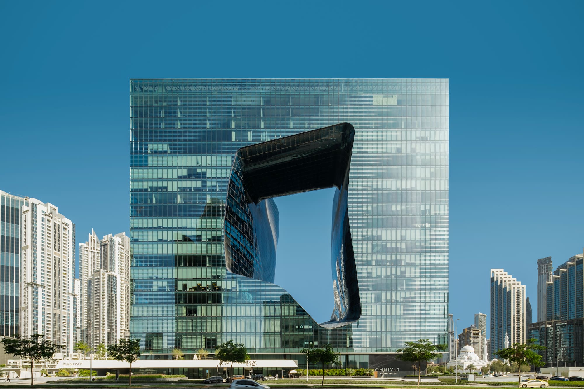 The Opus, Zaha Hadid's glass skyscraper with a curvilinear void, in Dubai.