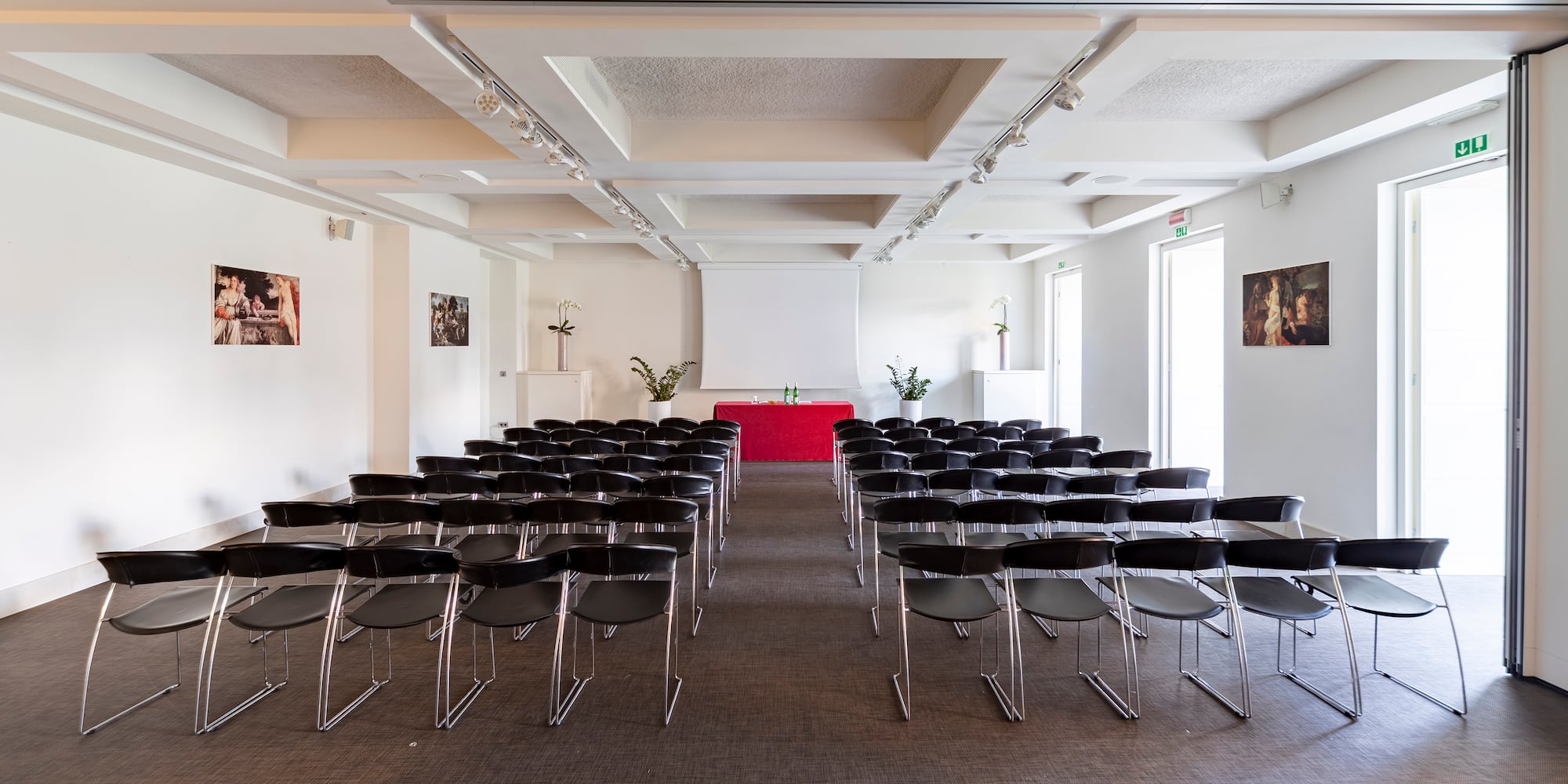 a room with rows of chairs