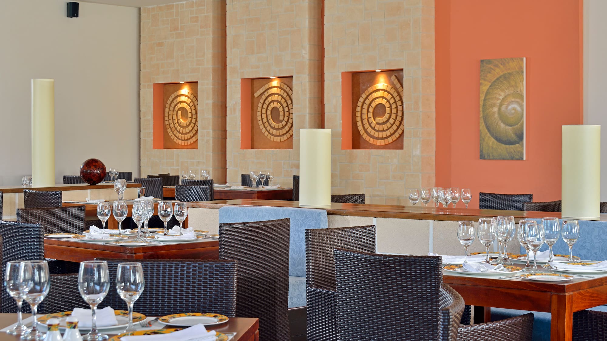 a restaurant with tables and chairs